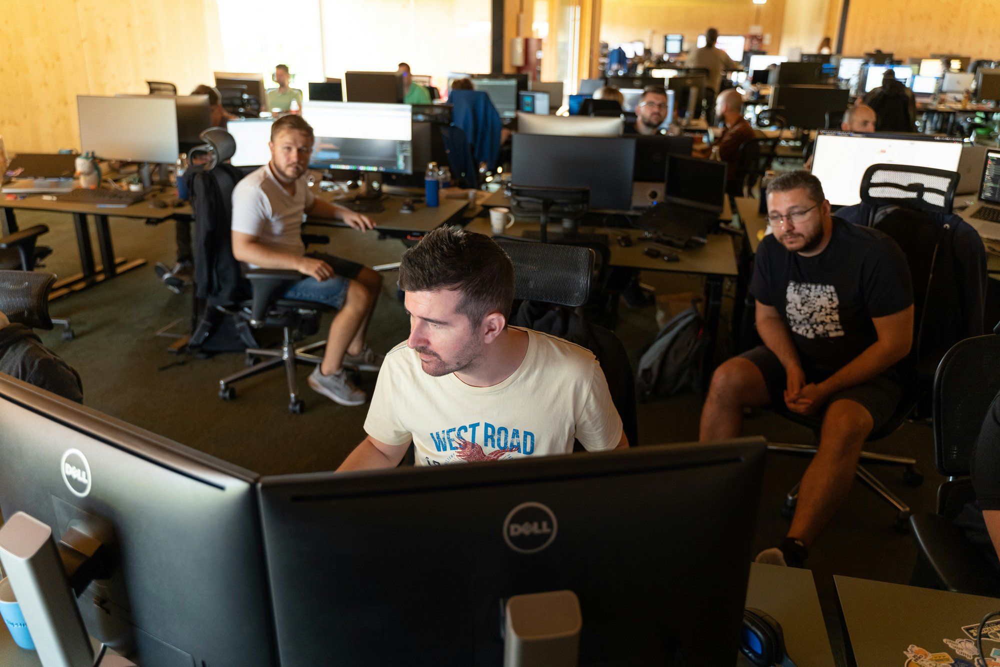 Group of men working on computers in an IT Department